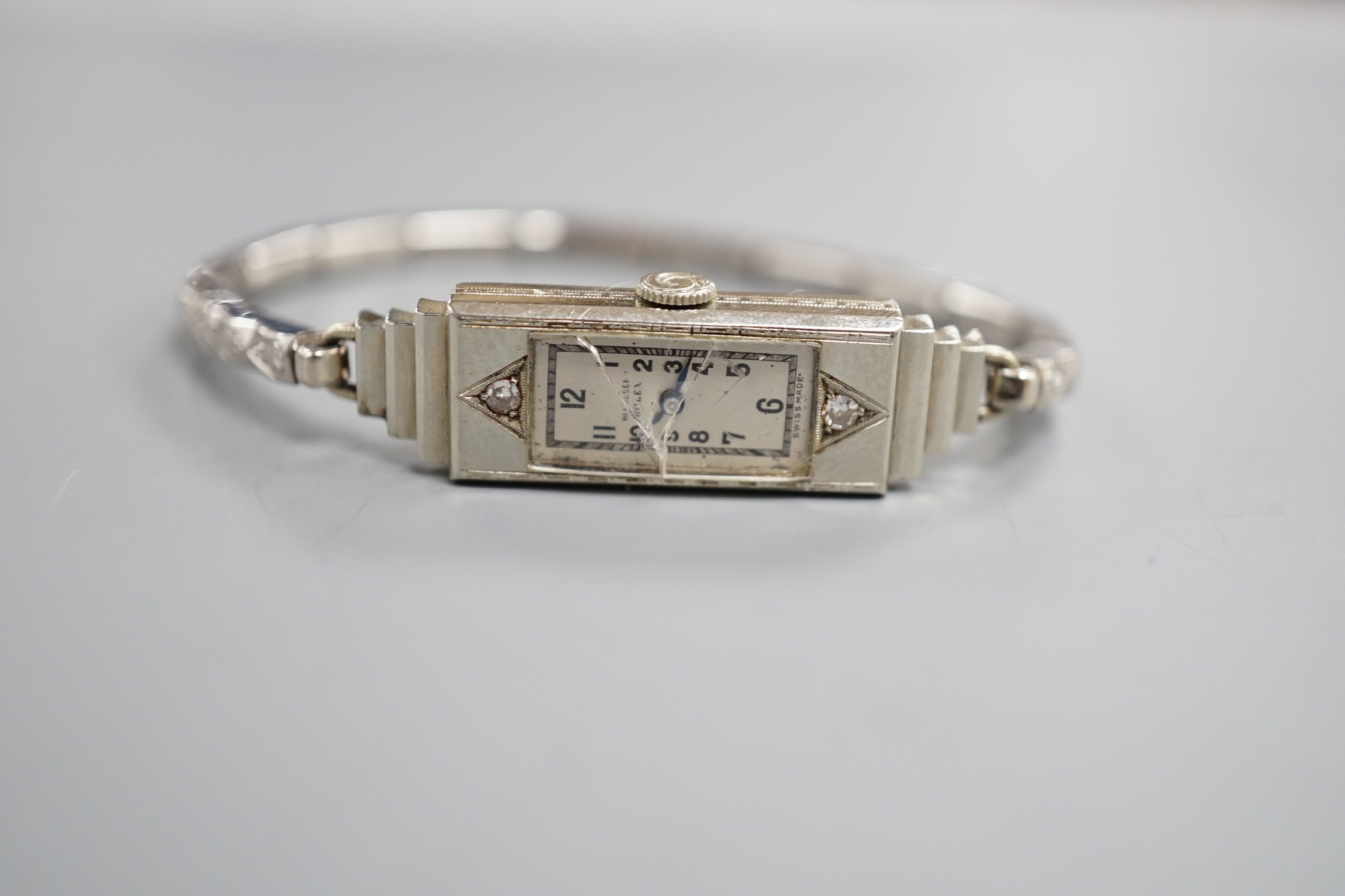 A lady's white metal and two stone diamond set C.R. Bucherer's Rolex Princess manual wind cocktail watch, case diameter 12mm.